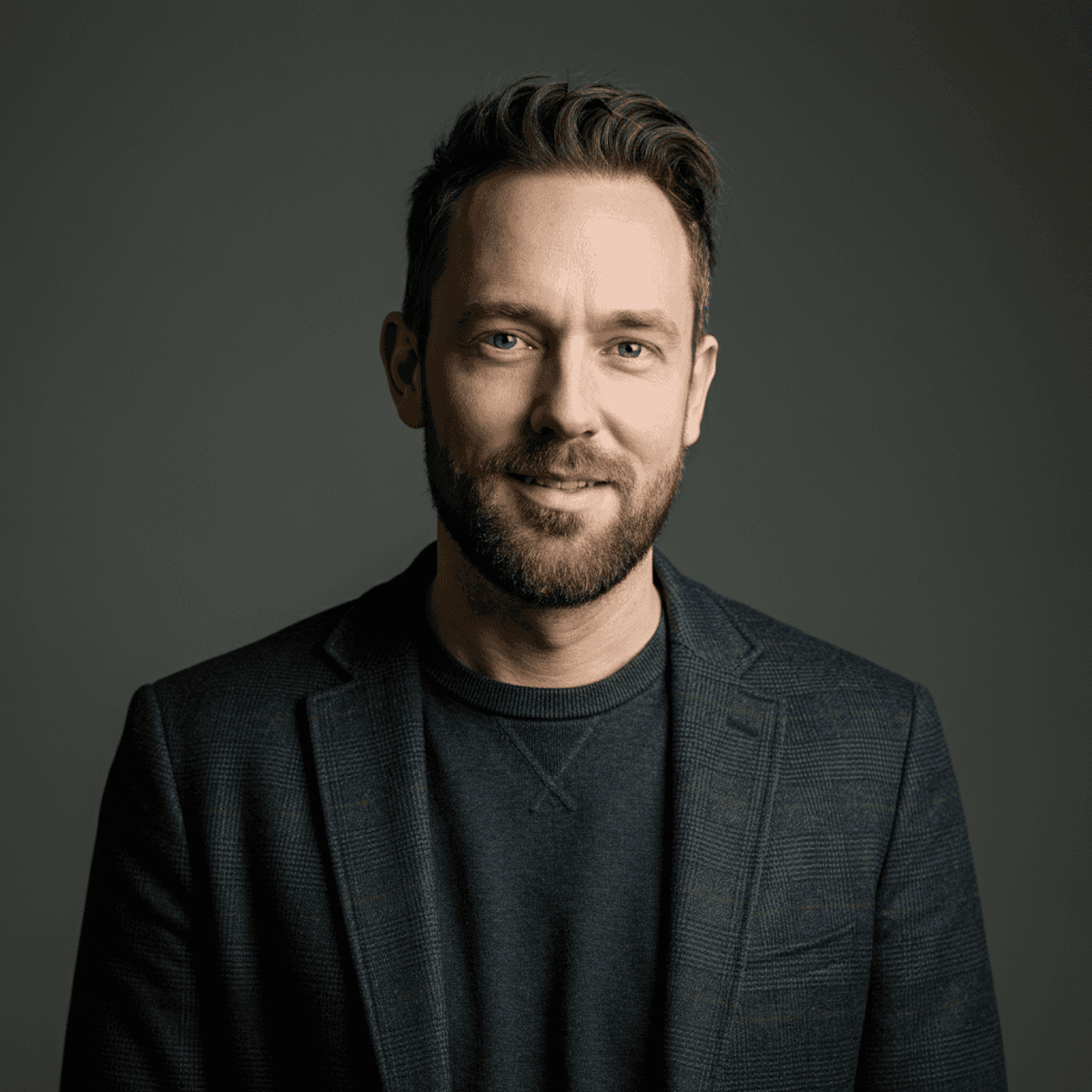a man with a dark background