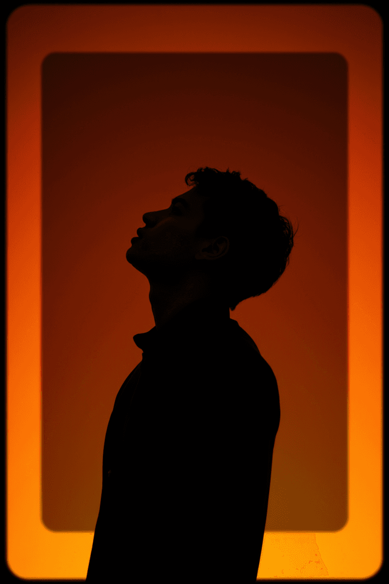 profile silhouette with orange background